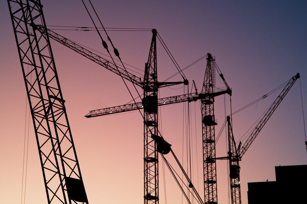 Tower cranes over a construction project
